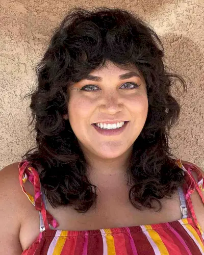 curly hair with curly long bangs