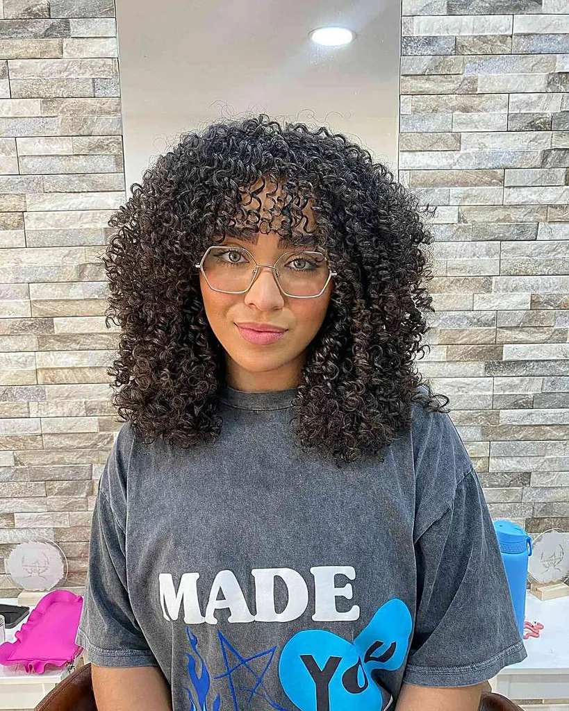 26 התמונות הללו מוכיחות מדוע גזרת Cadō היא פופולרית עבור נשים מתולתלות' title=