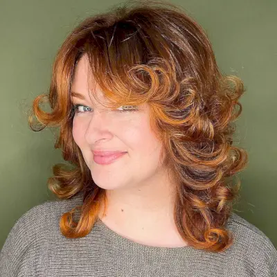 Flipped Out Loose Curls with curtain bangs