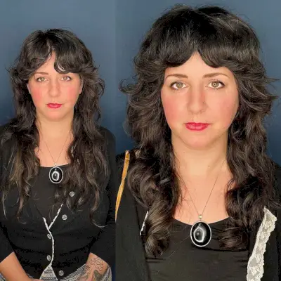 Long Layers with Loose Curls and curtain fringe