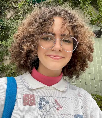 Short Coiled Curls with curtain bangs