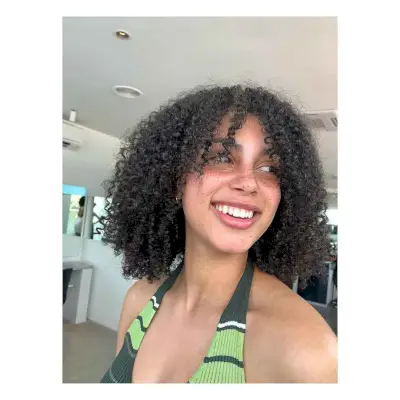 Coiled Curls with Curtain Bangs