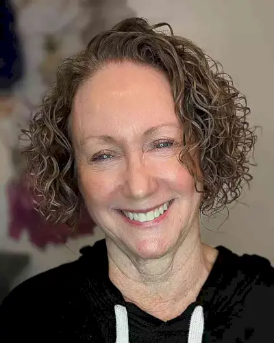 No-Bangs Permed Curls on Jaw-Length Haircut for Women Over 60