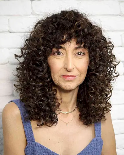 Full Curls at Collarbone Length for 60-Year-olds