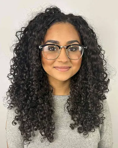 Perfectly Shaped Long Curly Style for women with eyeglasses and prominent cheeks