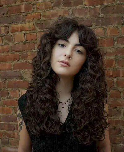 Long Diffused Curls and curtain bangs for women with long hair