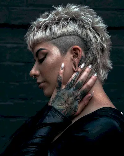 Edgy Modern Mohawk with Shaved Sides Hairstyle