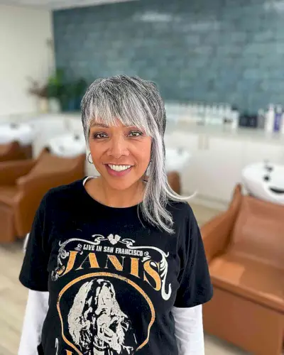 Edgy Creative Asymmetric Cut with a silver hair color