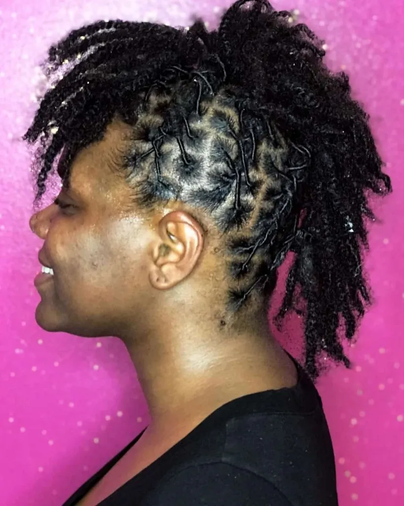 Korthårig mohawk med dreadlocks' title=