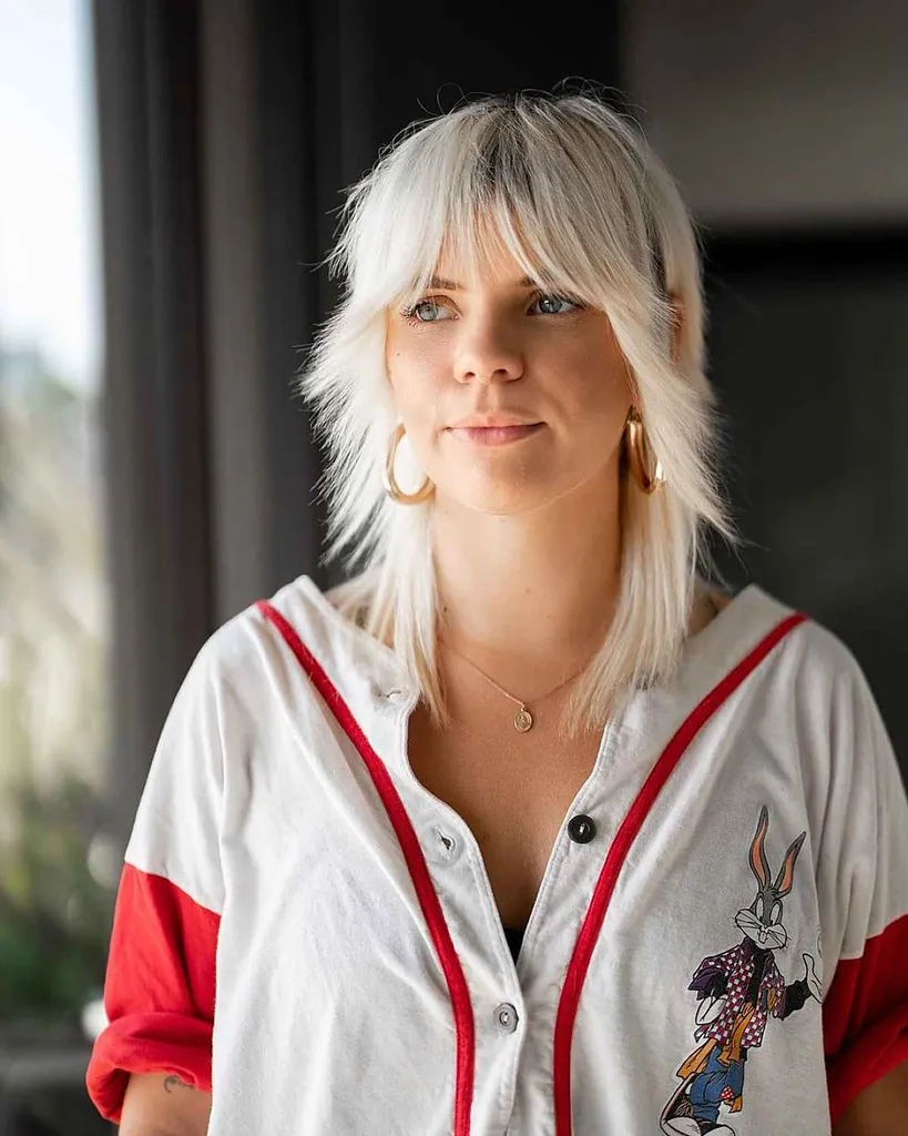 frånkopplad mullet punk frisyr' title=