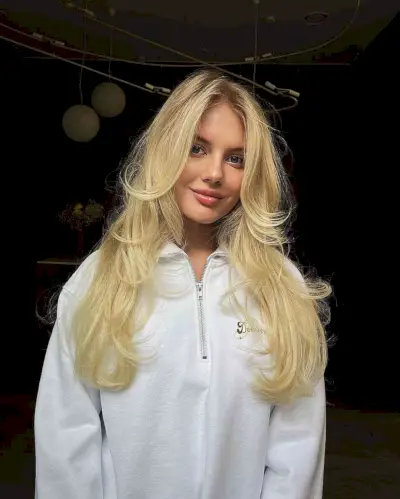Long Blonde Curled Layers and Long Bangs
