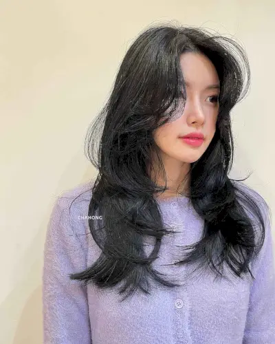 Layered Hair with Face-Framing Bangs