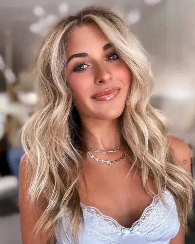 Face-Framing Middle Part Style with Wispy Layers for Long Hair