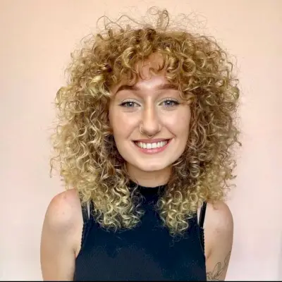 Medium-length style for curly hair and square faces
