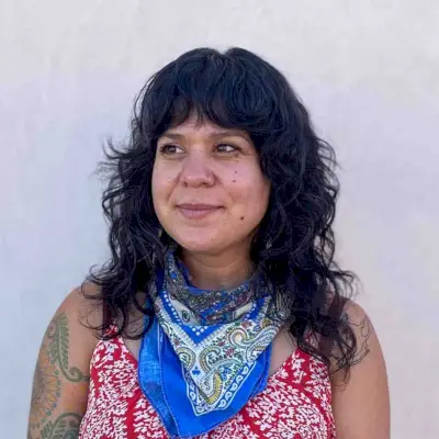 Textured Shaggy Haircut with Wavy Bangs for Round Faces