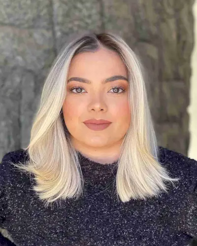 Rooted Blonde Medium Hair Parted In The Middle for Round Faces