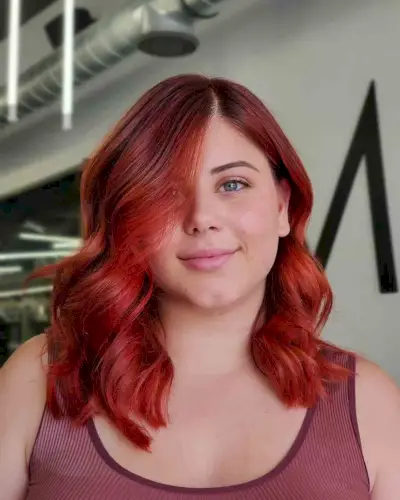 Side Part Style on an Extra Long Bob Haircut for a Round Face