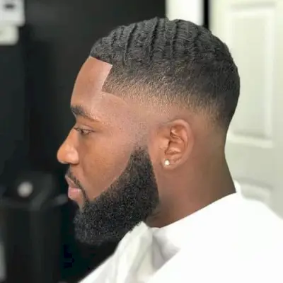 Low bald fade with waves for black men