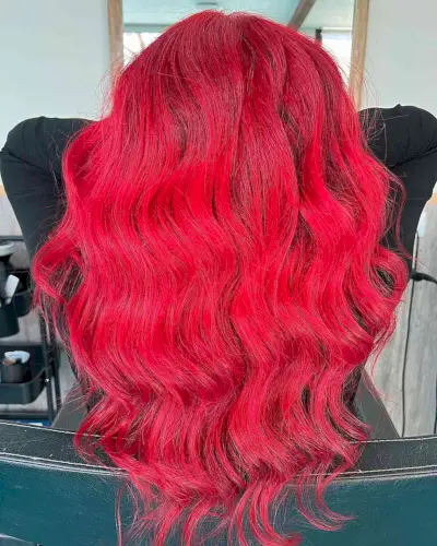 Bright Red Hair Dye for women with long wavy hair