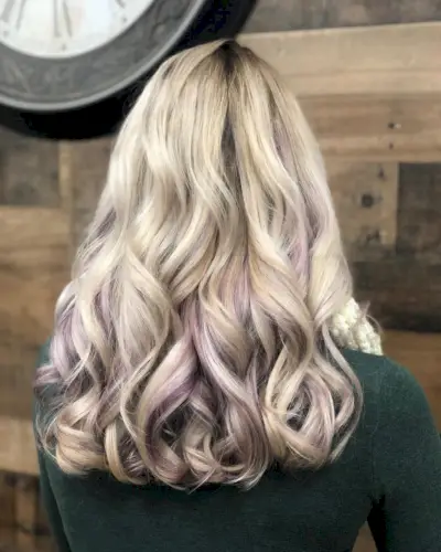 Pastel Lavender Peekaboo Highlights on Loose Curly Style