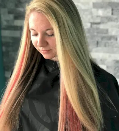 Light Red Peekaboo Highlights on Light Blonde Hair