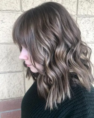 Natural Blonde Peekaboo Highlights on Dark Brown Hair