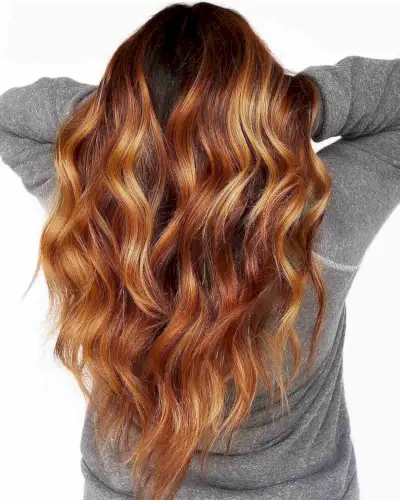 Vibrant Copper Balayage with Dark Roots