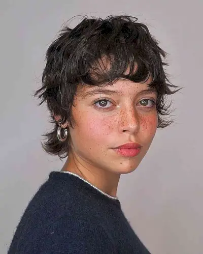 Choppy Shaggy Pixie with Fringe for Fine-Haired Women with tan skin and dark eyes