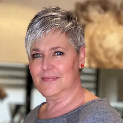 Short tapered haircut for women over 50 with fine hair