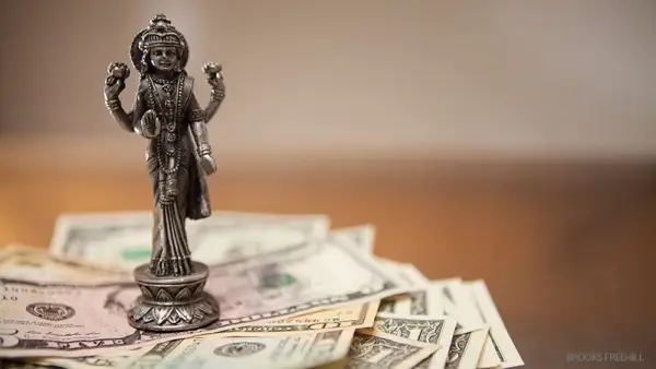 the yoga of money, money, foreign currency, travel, ganesh
