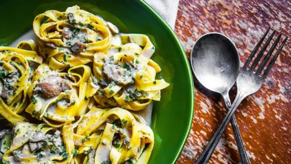 Whole Wheat Fettuccine with Mushroom Cream Sauce and Crispy Shiitakes