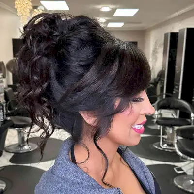 Soft Messy Updo with Side-Swept Bangs