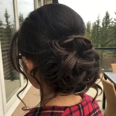 Messy Bun with Loose Curls hairstyle