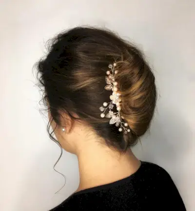 Elegant Chignon with a Flower Pin