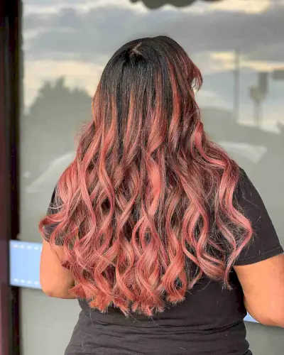 Black Hair with Rose Gold Balayage Highlights