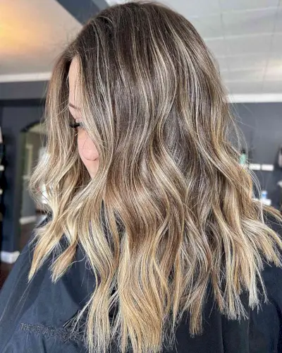 Dark-Rooted Golden Bronde Balayage Highlights for Shoulder-Length Hair