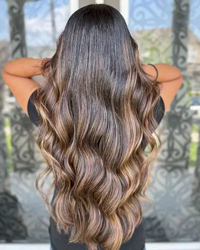 Dark Black Base with Light Caramel Balayage for Very Long Hair