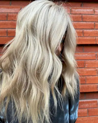 Bright Light Blonde Hairstyle for women with long thick hair