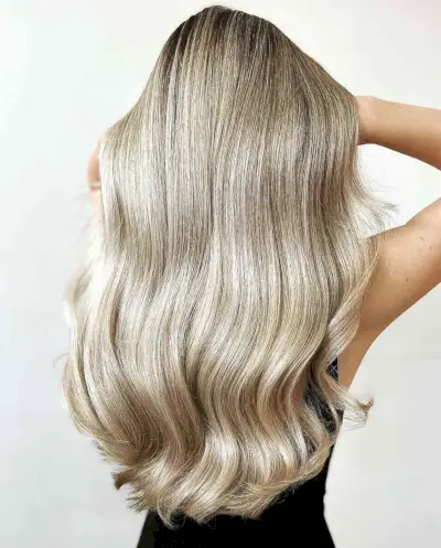 Buttery Light Blonde Straight Hair with Darker Roots