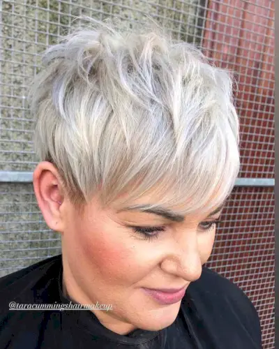 Icy Blonde Long Pixie Cut with Sweeping Bangs