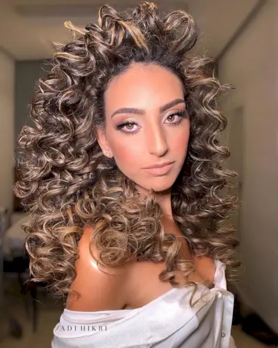 mousy brown highlights on curly black hair