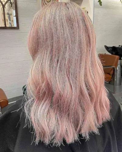 Lived-In Rose Gold hair color on medium-length hair