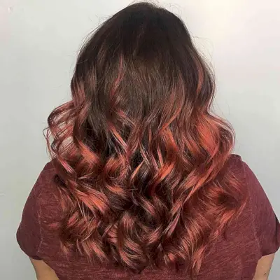 Low-Maintenance Vibrant Copper Red Balayage on Mid-Length Dark Brown Hair