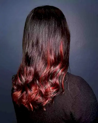 Dark Brunette with Fire Red Balayage Highlights for Medium-Length Hair with Wavy Ends
