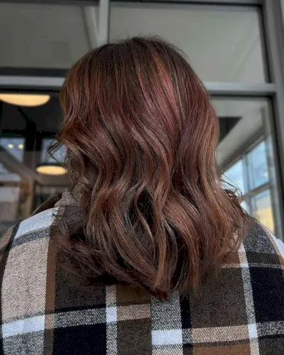 Hints of Brown Red Balayage Hues for Mid-Length Layered Cut