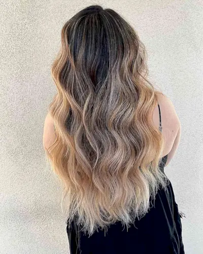 Super Long Haircut with Golden Balayage and Beach Waves