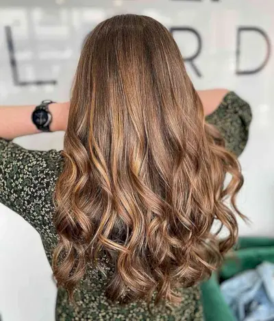 Glossy Brunette Balayage for Long-Length Curled Hair
