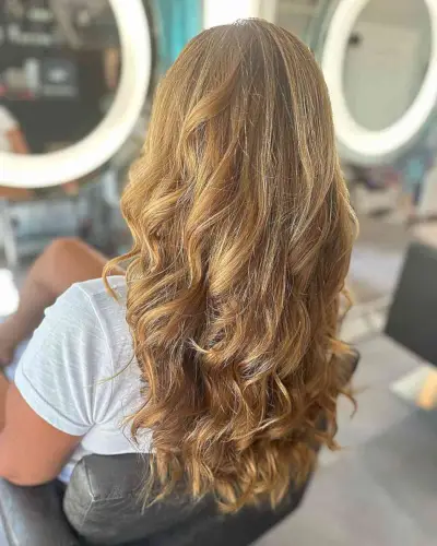 Very Long Sun-Kissed Balayage Hair with Soft Curls