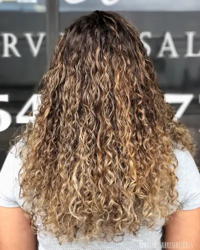 Versatile Sandy Blonde Balayage for Naturally Curly Hair
