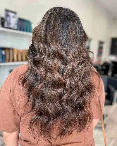 Vivid Light Brown Balayage on Dark Layered Hair